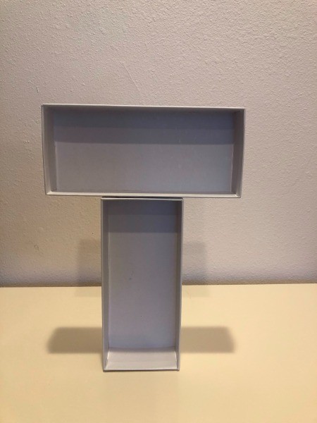 Two empty recycled boxes.