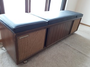 A console bench with a stereo inside.