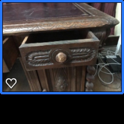 A close up of the desk drawer.