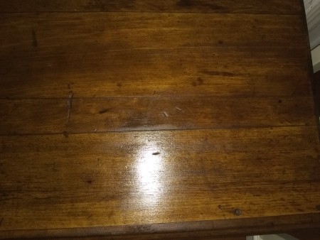 The top of a wooden desk.