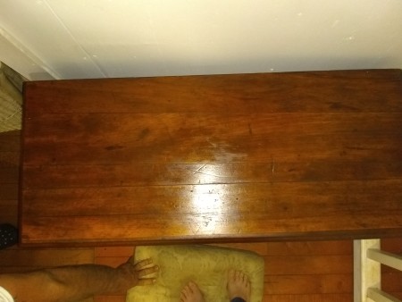 The top of a wooden desk.