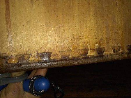 The drawer construction of an old wooden desk.