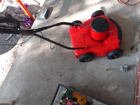 A red lawnmower.