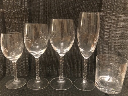 A set of glassware with a spiral twisted stem.