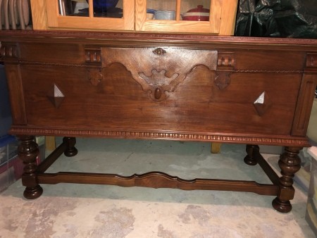 A hope chest with four legs.