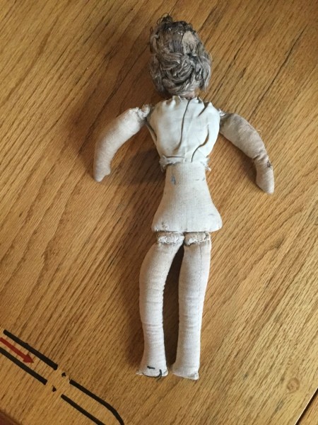 A back view of the doll.