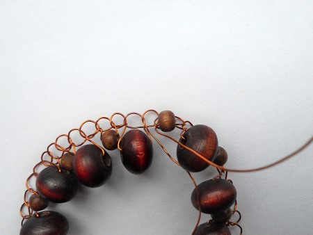 Closing the wire bangle.