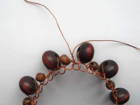 Twisting the wire ends together.