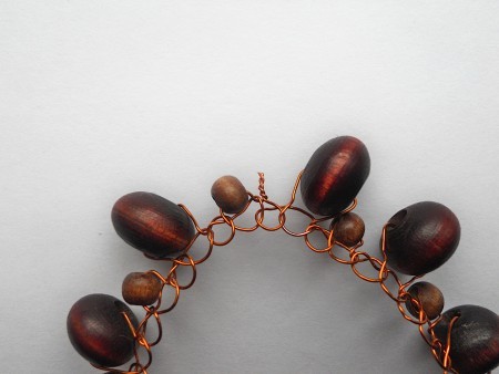 Twisting the wire ends together.