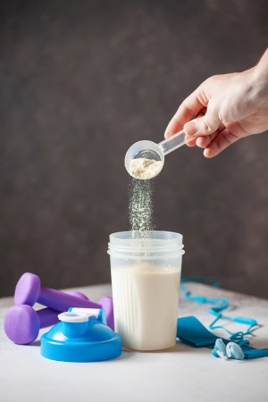 A protein shake being made in a shaker.