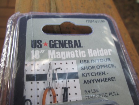 A magnetic holder in packaging.