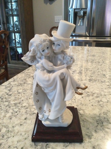 What is the value of a Giuseppe Armani- Just Married statue.
A figurine of two children getting married.