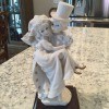 What is the value of a Giuseppe Armani- Just Married statue.
A figurine of two children getting married.