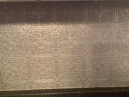 The wallpaper painted silver.