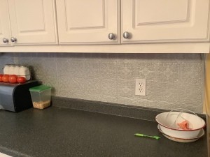 The painted kitchen backsplash.