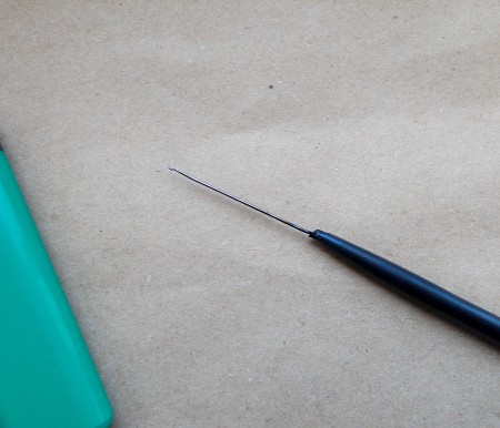 How to Make a Thin Crochet Hook - inserted into sharp end of plastic hook