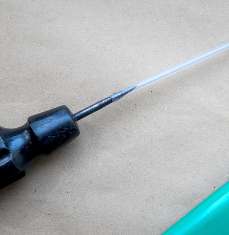How to Make a Thin Crochet Hook - using awl to expand one end of the empty refill