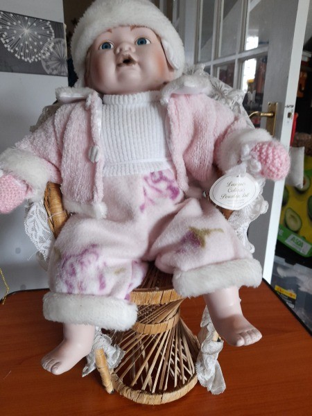 A porcelain baby doll.