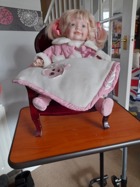 A porcelain baby doll.