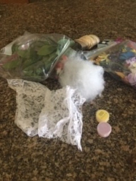 Supplies for making lacey sachets.