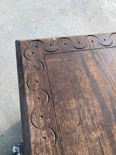 The top of a wooden desk.