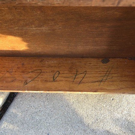 Markings on a woode desk.