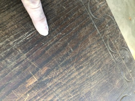 The top of a wooden desk.