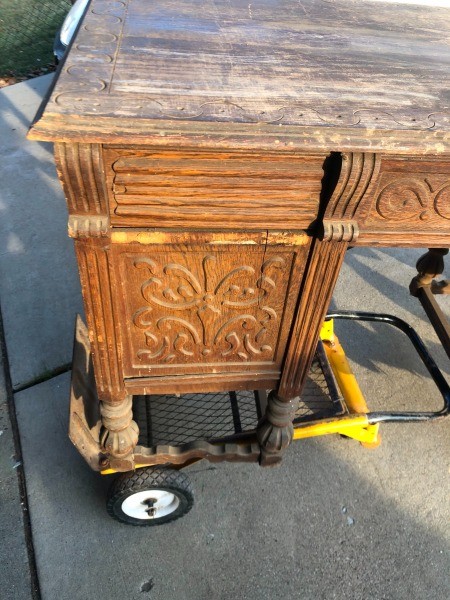 An ornate wooden desk.