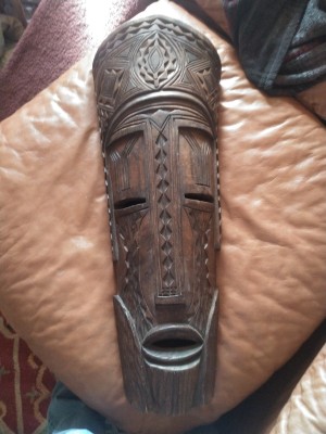 A carved wooden mask.