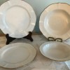 Different sized china plates.