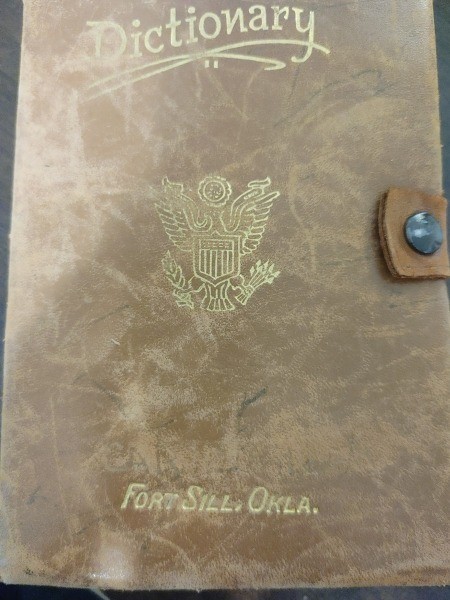 The front of an old dictonary.