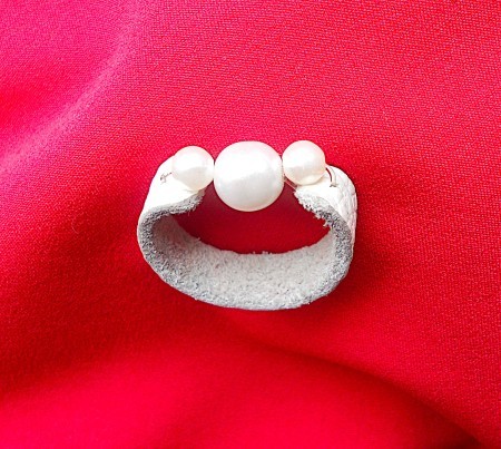 The completed leather beaded ring.