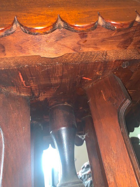 The underneath of a game table.