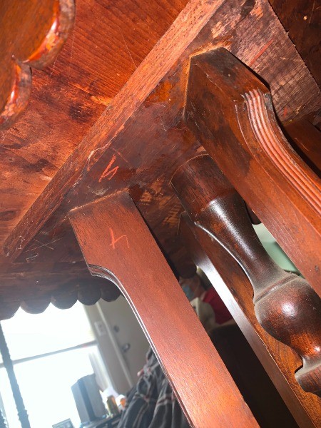 The underneath of a game table.