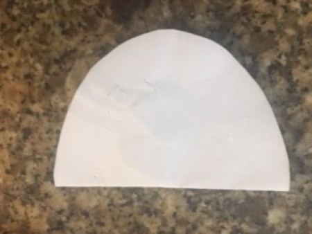 A half egg shaped piece of paper.