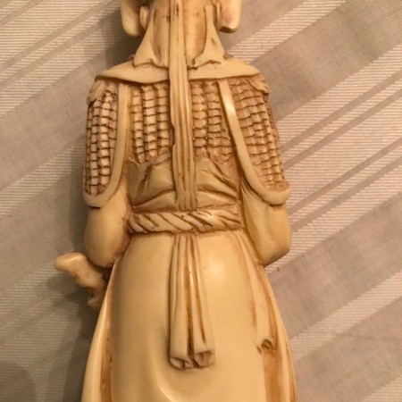 The back of a figurine.