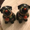 Two black dog figurines.