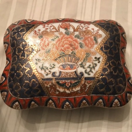 A small ornate china box.