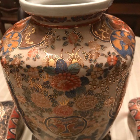The side of an ornate vase.