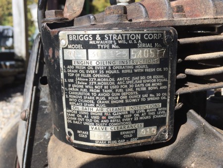 The manufacturer information on a vintage self propelled mower.