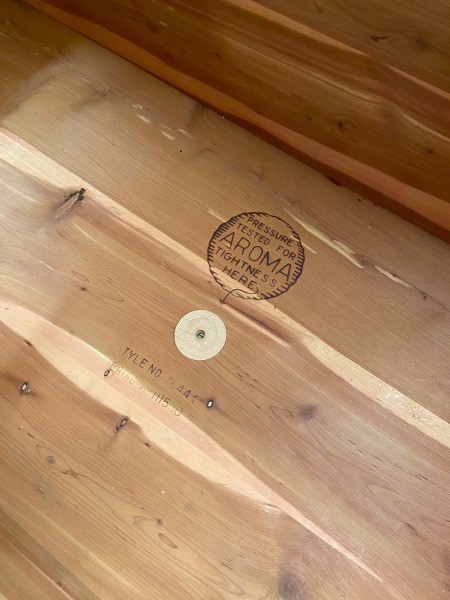 The marking inside a cedar chest.