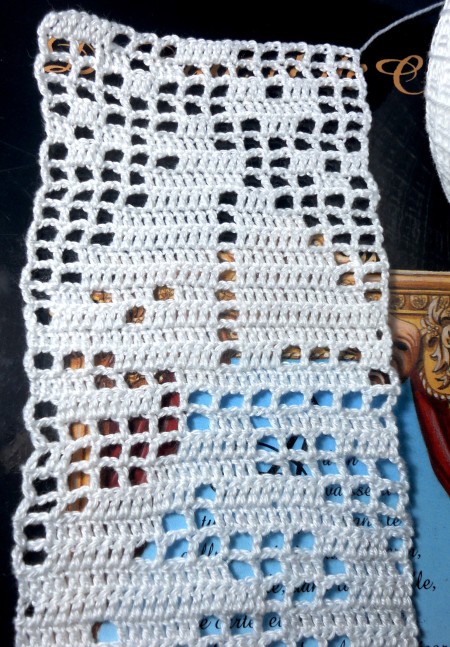 The completed crochet bookmark.
