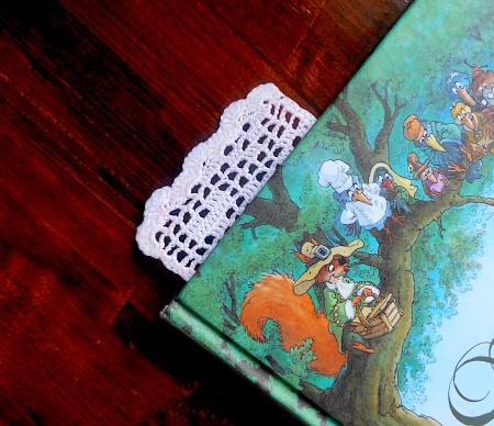 The completed bookmark in a book.