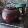 A ceramic pot with a lid.