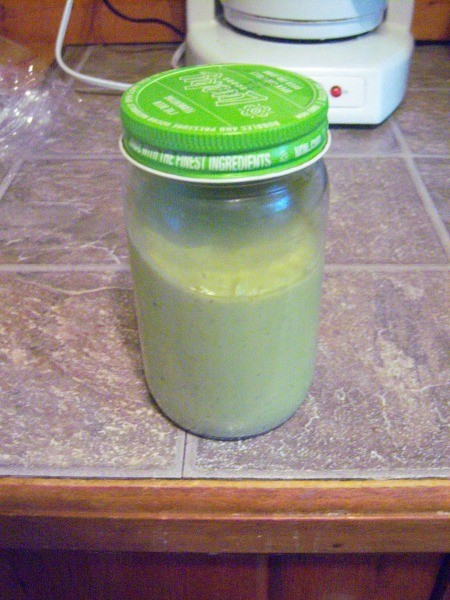 A jar of avocado dressing.