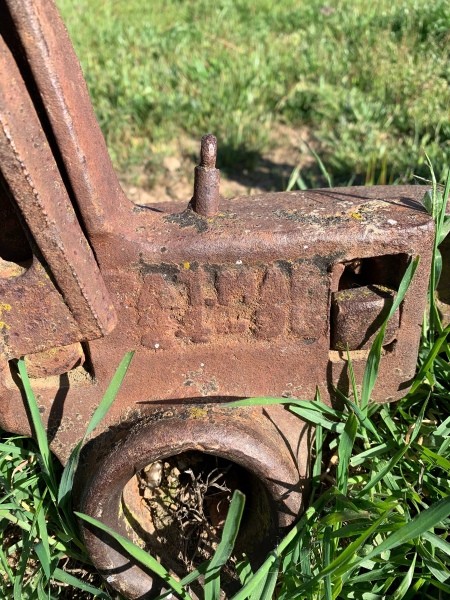 An old piece of farm equipment.