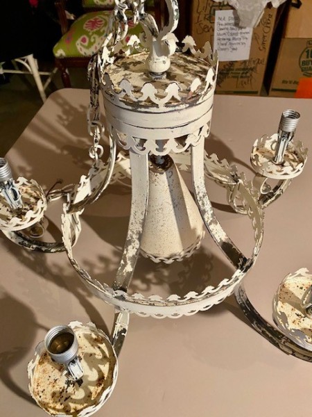 An old cream colored chandelier.