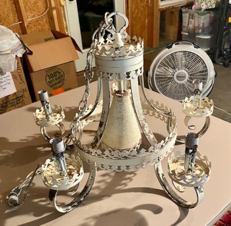 An old cream colored chandelier.