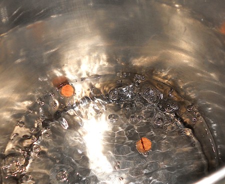 Boiling the cork plugs.