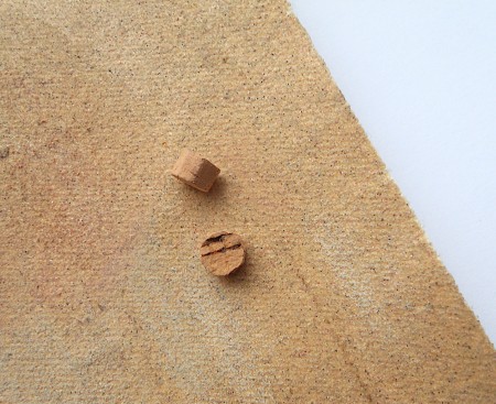 Two small cork plugs.